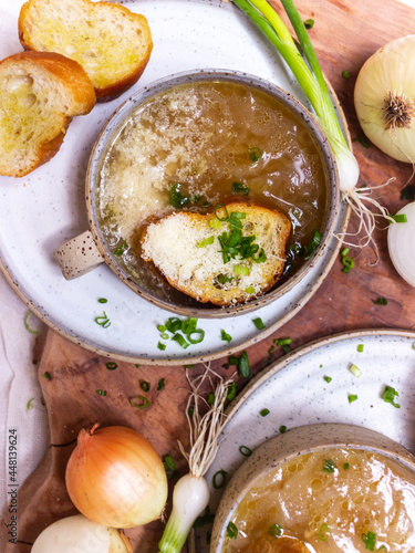 French cuisine onion soup in a ceramic cup with croutons