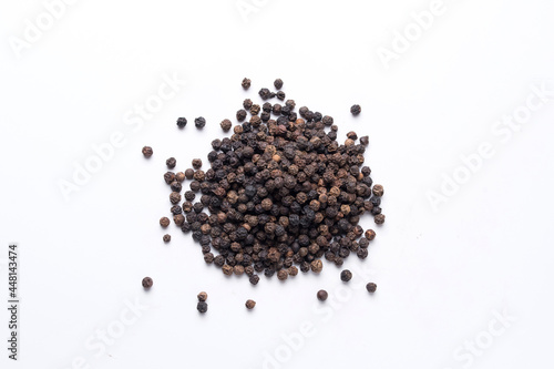 Black pepper, Piper nigrum, flatlay shot against white background