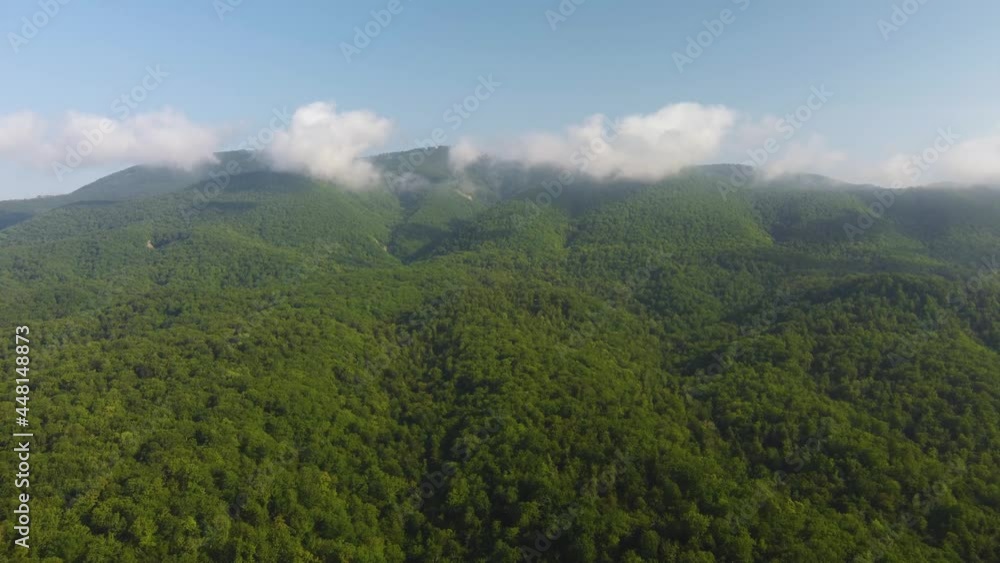 mountains in the greenery view from the air. video from a quadrocopter mountains in the greenery view from the air. video from a quadrocopter