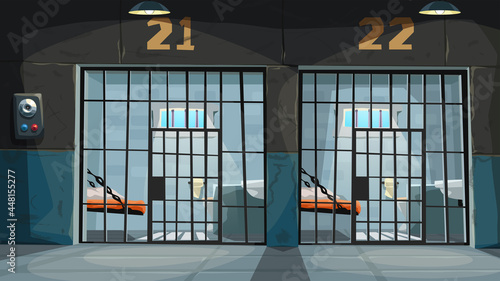 view on prison cells through metal bars