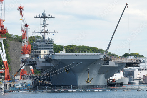 US Navy aircraft carrier George Washington under repair at Yokosuka Port in Japan. photo