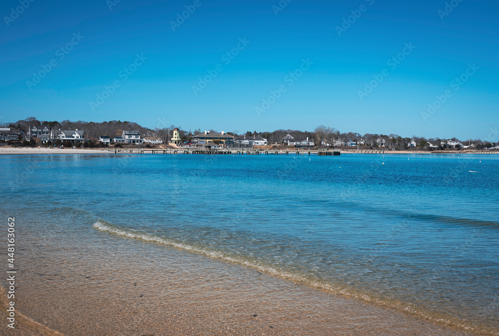 Tranquil beach with gentle waves rolling in at Hyannis Harbor