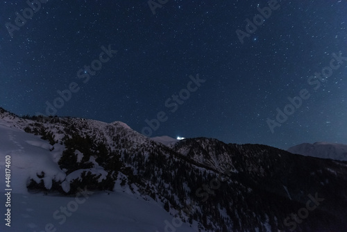  Bright starry sky with the milky way on the background of High Tatras mountains