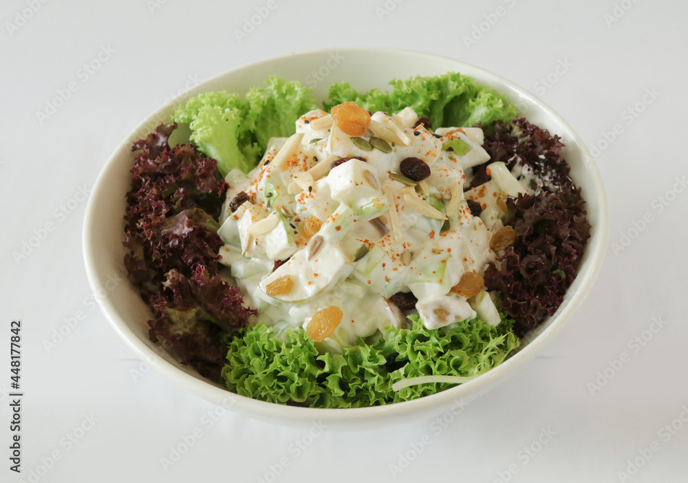 season green vegetables, potato and fruit apple coleslaw with salad dressing sauce appetiser in white background Christmas festival menu season green vegetables, potato and fruit apple coleslaw with salad dressing sauce appetiser in white background Christmas festival menu