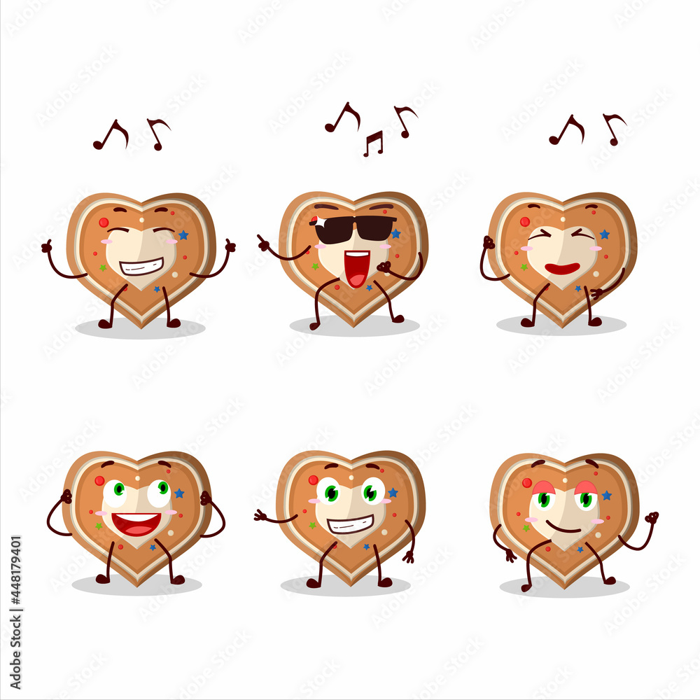 An image of gingerbread heart dancer cartoon character enjoying the music An image of gingerbread heart dancer cartoon character enjoying the music