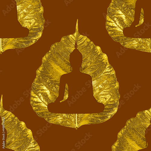 Seamless image pattern of beautiful silhouette Buddha statue shape of sitting on a gold leaf or Pho leaf (bo leaf,bothi leaf) on the colour of a Buddhist monk, brown colour. photo