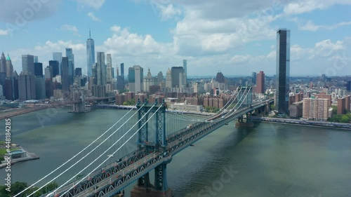flying counter clockwise around Manhattan Bridge view of downtown NYC photo