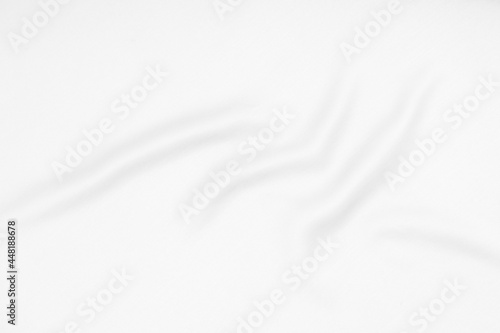 White fabric, cloth waves texture background. Wide image.