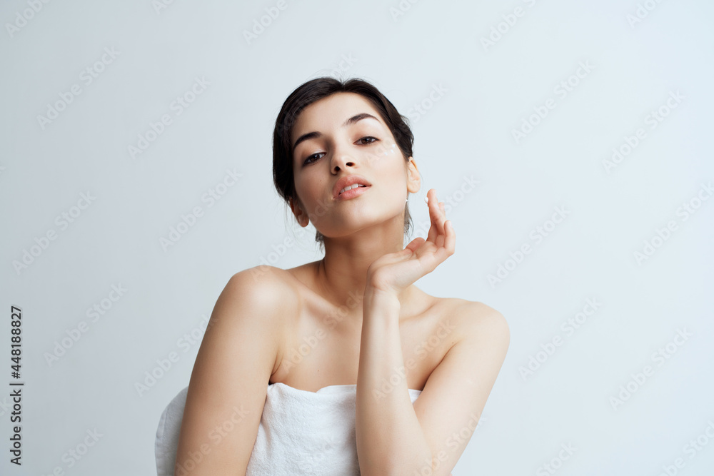woman with naked keys in towel clean skin health cosmetics