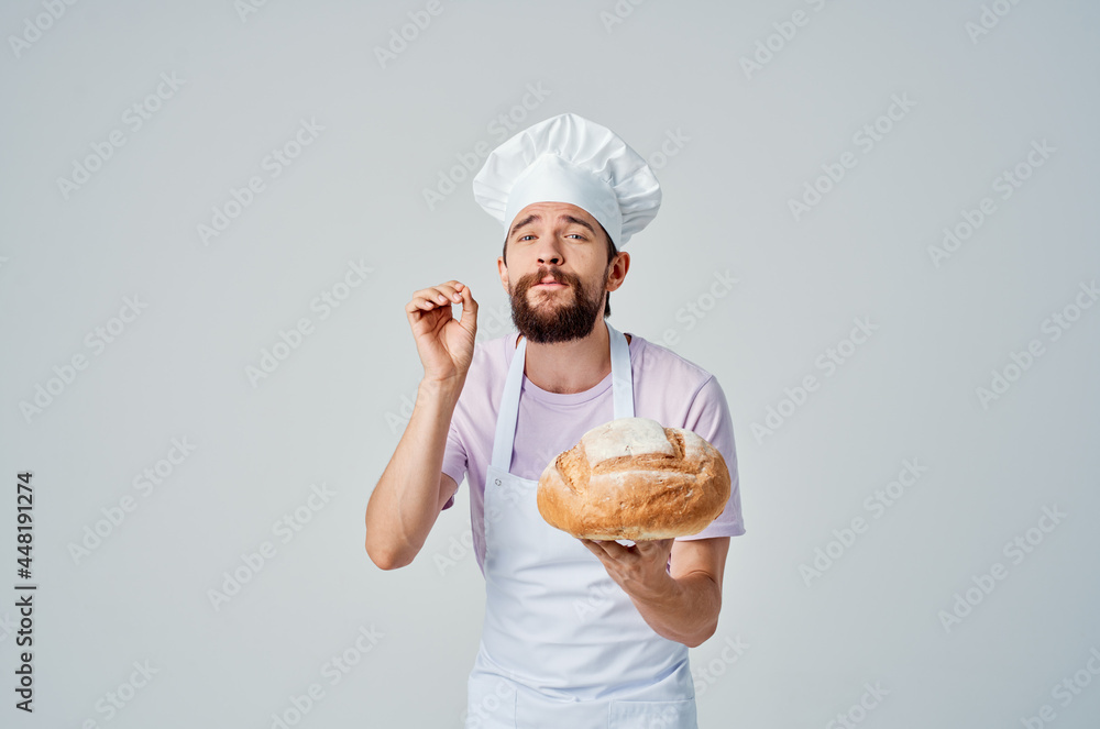 man in chef's uniform cooking food baking cooking man in chef's uniform cooking food baking cooking