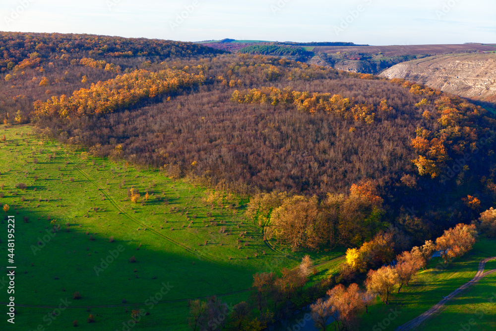Awesome aerial view of autumn nature . Landscape with treetops in the fall 