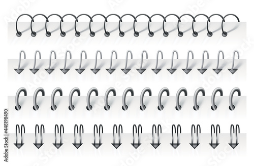 Notebook spirals, wire steel ring bindings and springs for calendar, diary, notepad, document cover or booklet sheets. Metal stitch isolated on white background. Can use as page divider