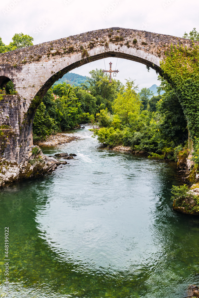 Roman bridge of medieval origin over the Sella river in the city of Cangas de Onis, Asturias, Spain.
