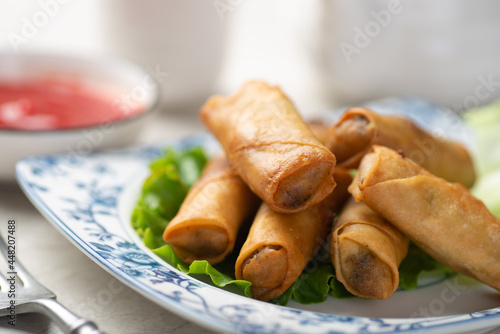 Delicious fried spring rolls and sweet chili sauce