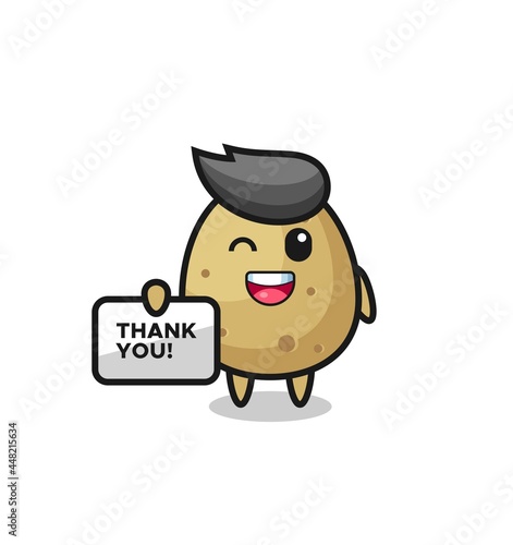 the mascot of the potato holding a banner that says thank you