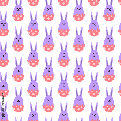 Seamless pattern with bunnies in egg shells.
