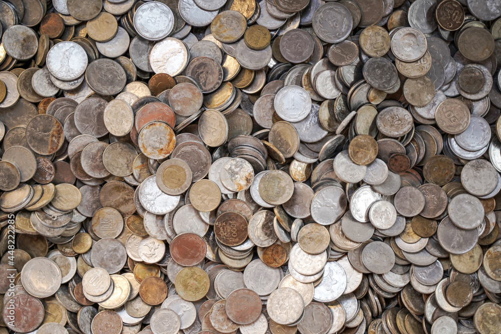 Old ancient coins background. Old ancient coins background. Many old copper coins in the chest as a symbol of wealth, money and treasure Old ancient coins background. Old ancient coins background. Many old copper coins in the chest as a symbol of wealth, money and treasure