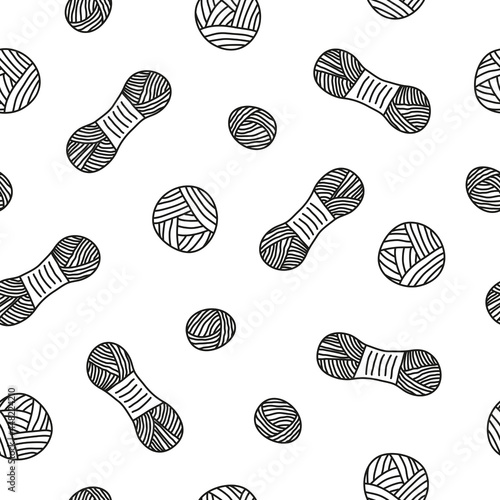 Seamless pattern with skeins and balls of yarn.