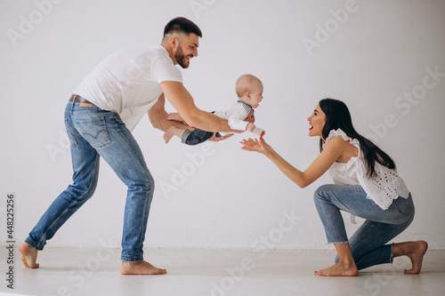 Happy family with their first child photo