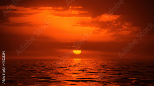 red sky sunset over the ocean © magann