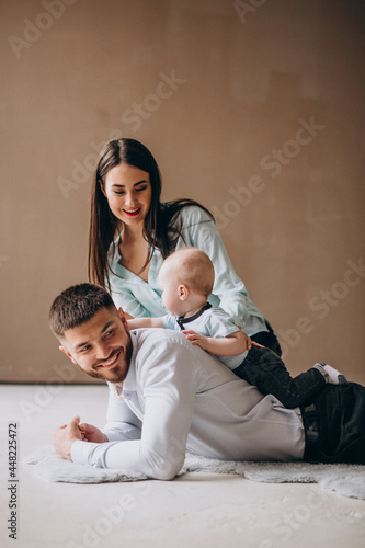 Happy family with their first child photo