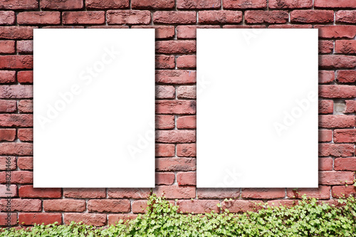 Withe blank frame mock up on red brick background.
