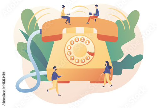 Big retro phone and tiny people. Phone Call. Incoming call concept. Communication device. Modern flat cartoon style. Vector illustration on white background