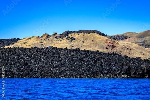 Views from volcano island Nea Kameni. Santorini - officially Thira and classic Greek Thera is an island in the southern Aegean Sea, about 200 km (120 mi) southeast from the Greek mainland. photo