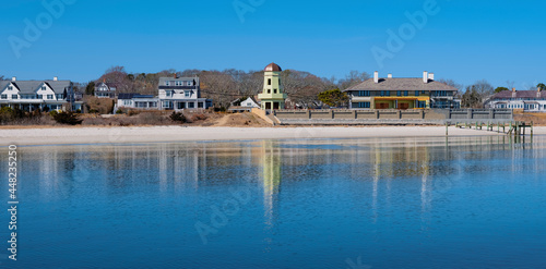 Panoramic Seaside Village on the Beach with Reflections on the Sea Water