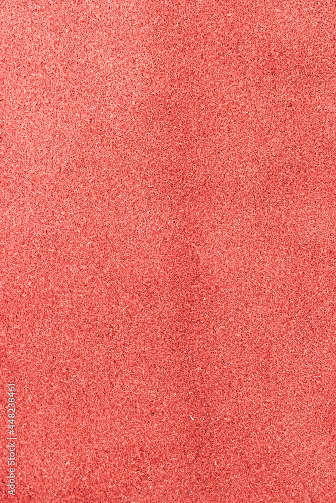 Closeup detail of red leather texture background. Closeup detail of red leather texture background.