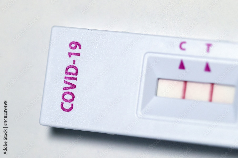 Positive Cassette rapid test for COVID-19, Test Result by Using Novel Coronavirus COVID 19 SARS COV-2 Antigen Lateral Flow Rapid Qualitative Test Kit white background. Antigen Test with copy space. Positive Cassette rapid test for COVID-19, Test Result by Using Novel Coronavirus COVID 19 SARS COV-2 Antigen Lateral Flow Rapid Qualitative Test Kit white background. Antigen Test with copy space.
