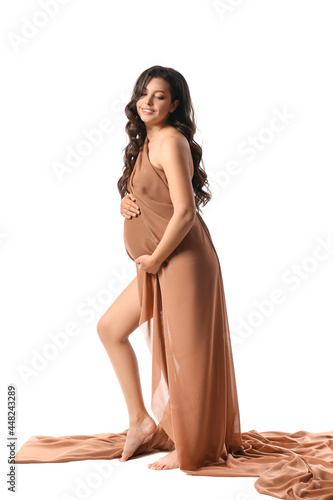 Pregnant woman in flowing f...