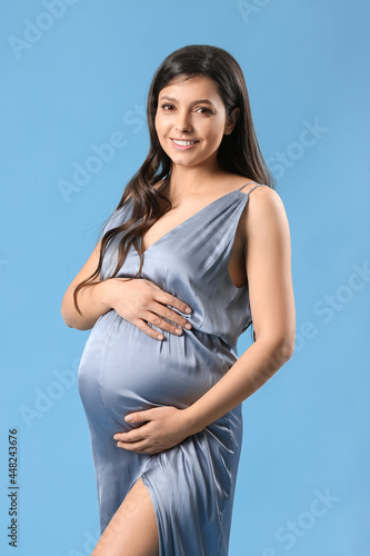 Beautiful pregnant woman on...