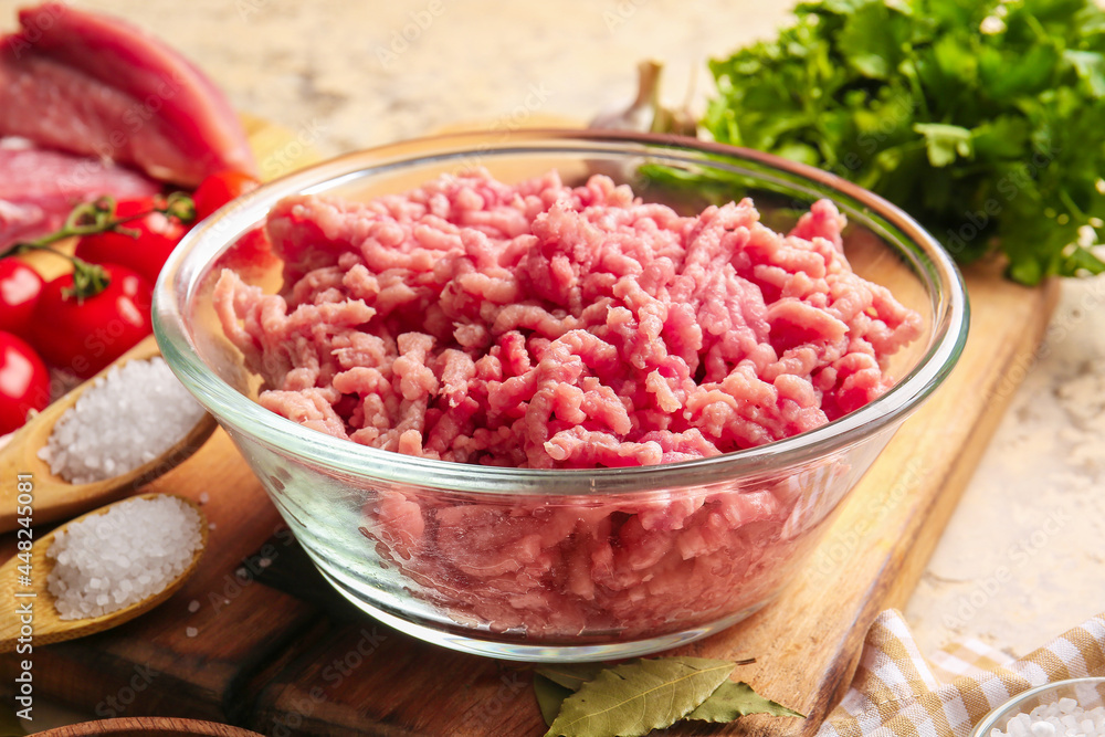 Bowl with fresh forcemeat on table Bowl with fresh forcemeat on table