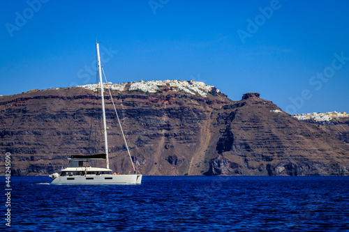 Santorini - officially Thira and classic Greek Thera is an island in the southern Aegean Sea, about 200 km (120 mi) southeast from the Greek mainland. photo