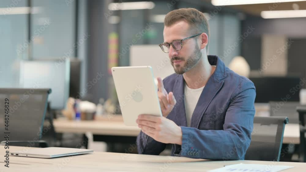 custom made wallpaper toronto digitalMiddle Aged Businessman making Video Call on Tablet in Office