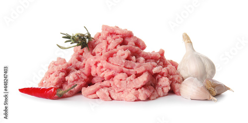 Fresh forcemeat, garlic and spices on white background