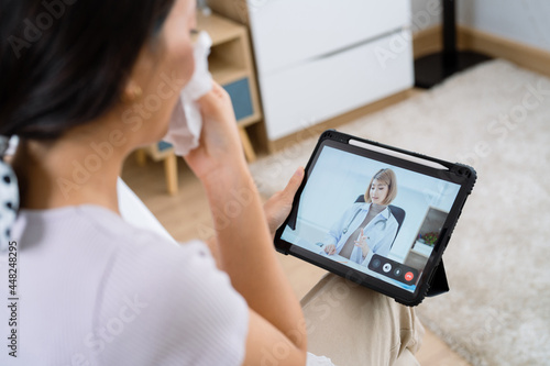 telemedicine , asian women consulting a doctor She is having flu symptoms
