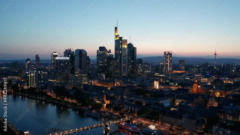 Frankfurt am Main Skyline and skyscrapers cinematic panorama drone aerial rotating shot sunset evening Frankfurt am Main Skyline and skyscrapers cinematic panorama drone aerial rotating shot sunset evening