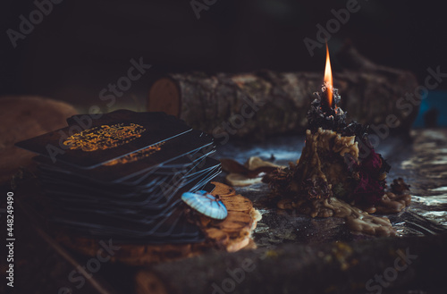 Wall Mural Candle burns on the altar, magic among candles, clean negative energy, wicca con