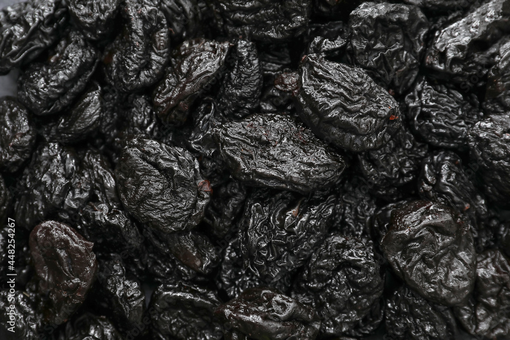 Tasty prunes as background, closeup Tasty prunes as background, closeup