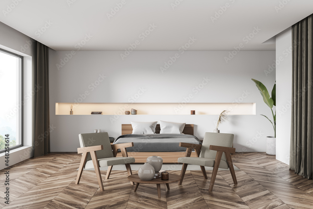 Fototapeta premium Bedroom with two armchairs and narrow niche in the white wall