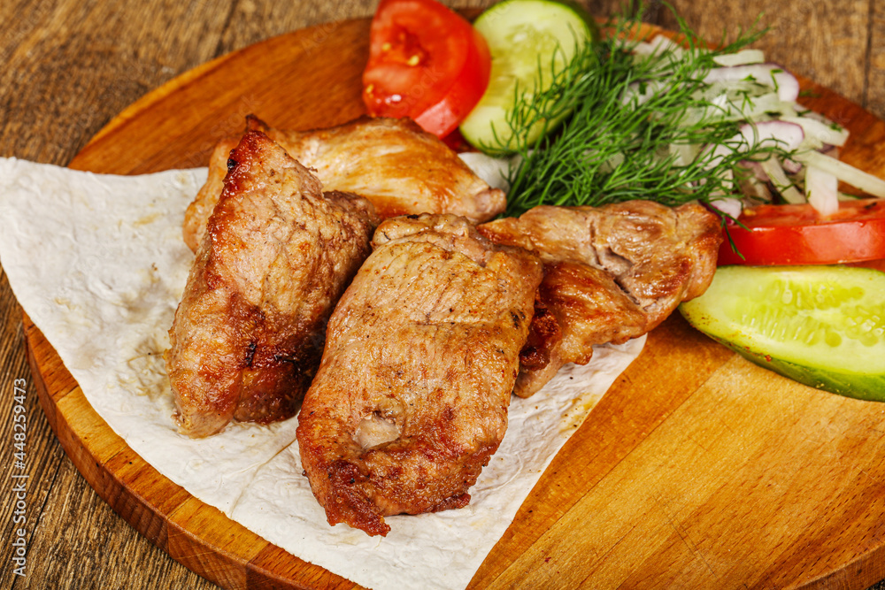 Grilled pork shashlick served vegetables Grilled pork shashlick served vegetables