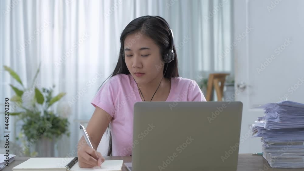 Business concept of 4k Resolution. Young Asian women are working hard at home. Business concept of 4k Resolution. Young Asian women are working hard at home.