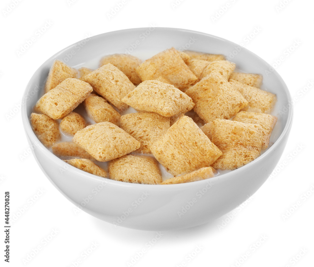Tasty corn pads with milk in bowl isolated on white Tasty corn pads with milk in bowl isolated on white