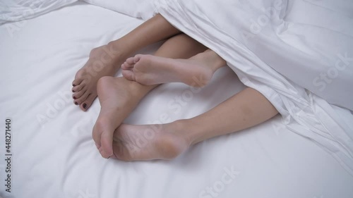 Health concept of 4k Resolution. The feet are moving on the bed. photo