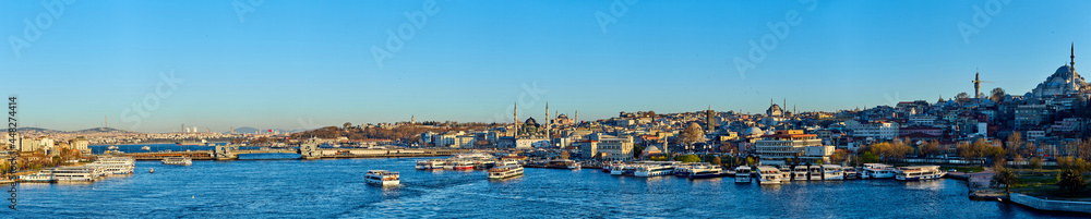 Istanbul, Turkey - 1 April, 2017: Panorama of Cityscape of Golden horn with ancient and modern buildings