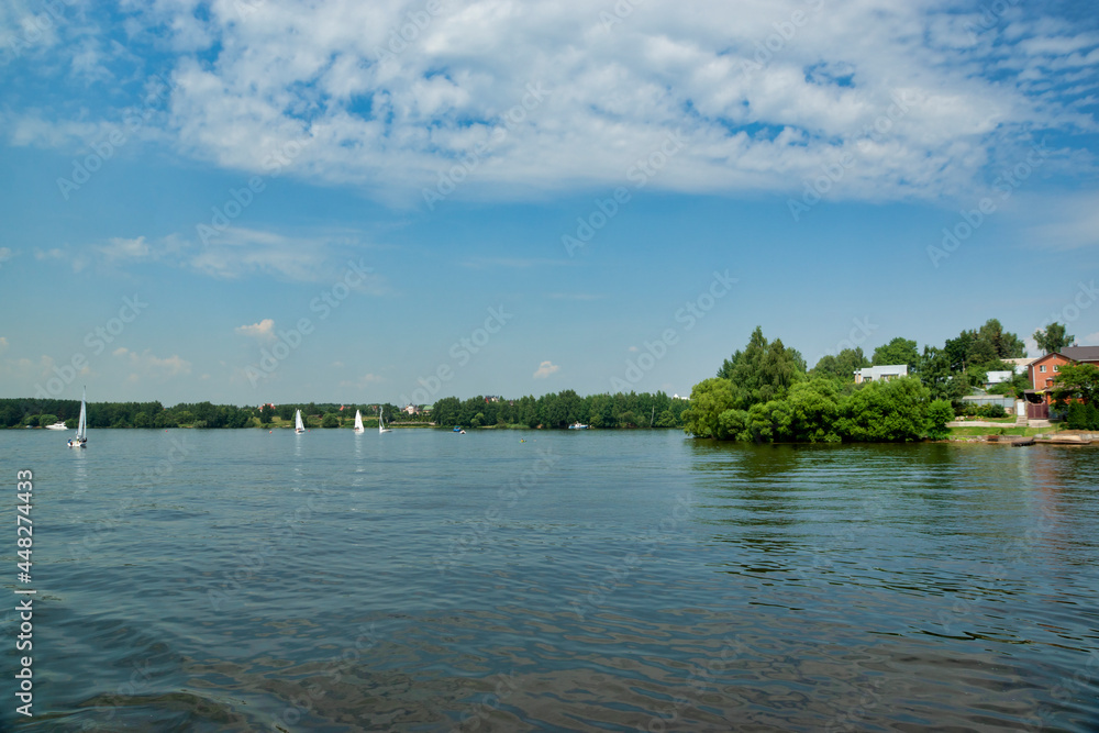 Embankment of the Klyazmensky reservoir, river walk along the Moscow water channel, Russia