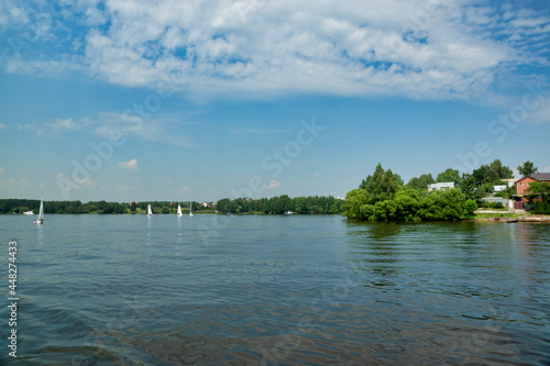 Embankment of the Klyazmensky reservoir  river walk along the Moscow water channel  Russia