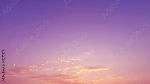 sun rays n clouds in magenta purple sunrise sky